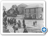 Band March in Raphoe Diamond, c1900 – 1910, Courtesy Raphoe Tidy Towns Local History Collection, Donated by 
Joseph Porter